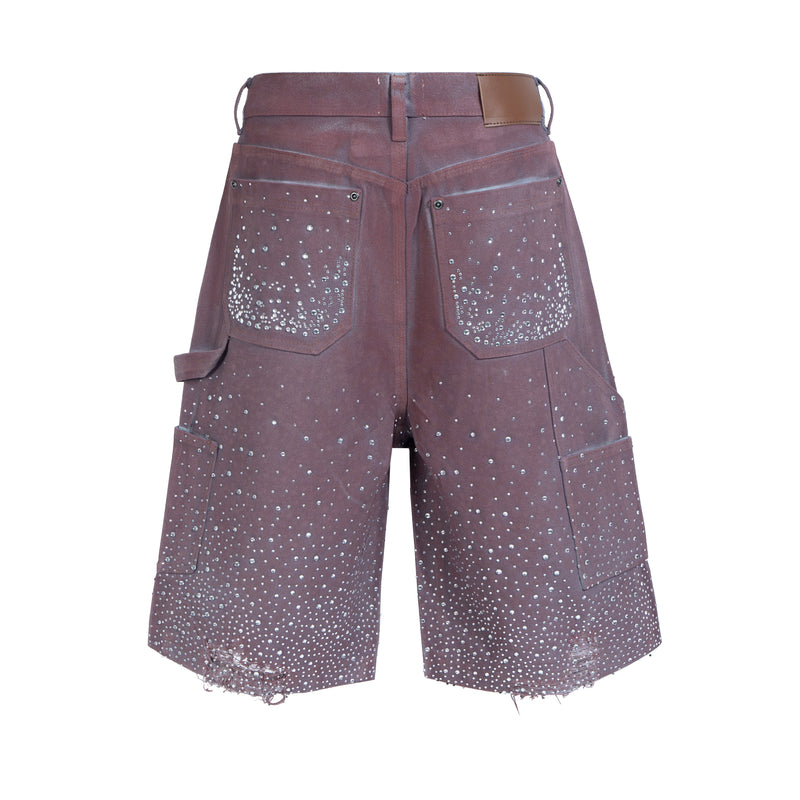 Back view of dark brown baggy denim shorts with rhinestone pockets and cargo side tabs