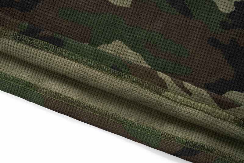 Close-up of hem seam and stitching on camo waffle knit sweatshirt