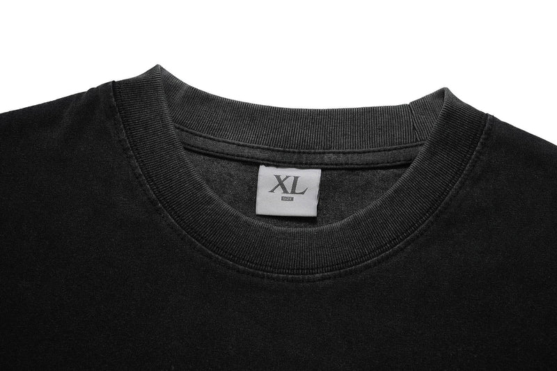 Black vintage washed graphic tee with ribbed crew neck and XL size label on the collar