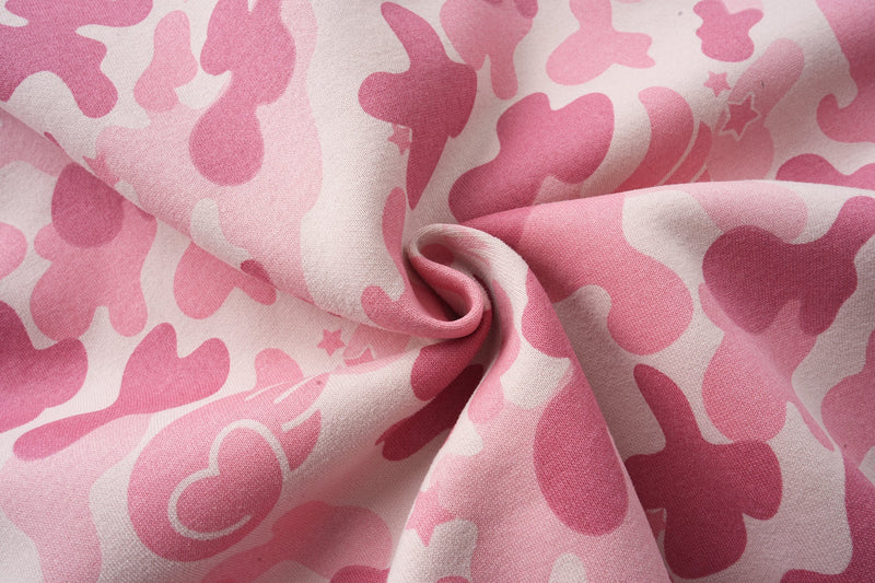 Close-up of pink camo fabric gathered in a soft fold