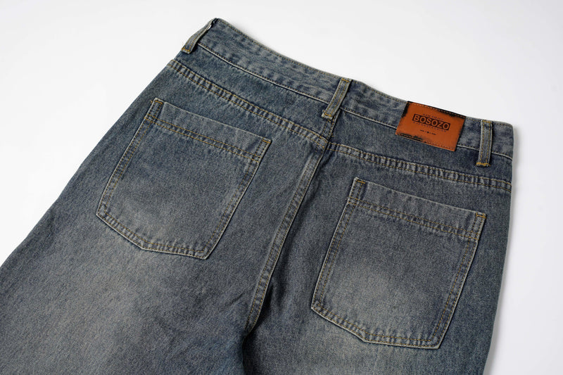 Spiral-Tear Grunge Wide-Leg Denim Jeans | Distressed Streetwear