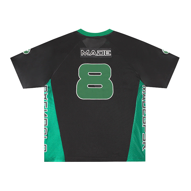 Black and green performance jersey with large number 8, mesh paneling, and MADE graphic on the back