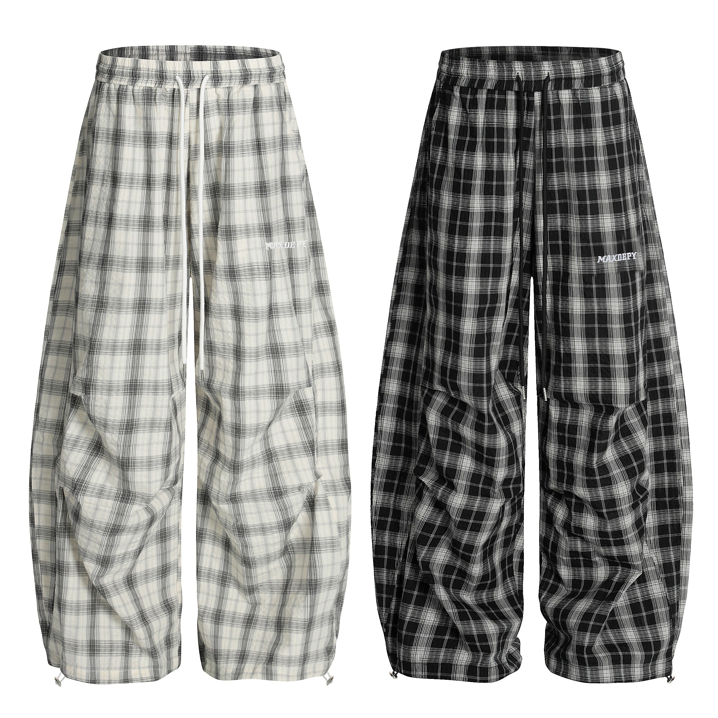 Ruched plaid wide-leg pants shown in off-white and black colorways with elastic drawstring waist and adjustable hem