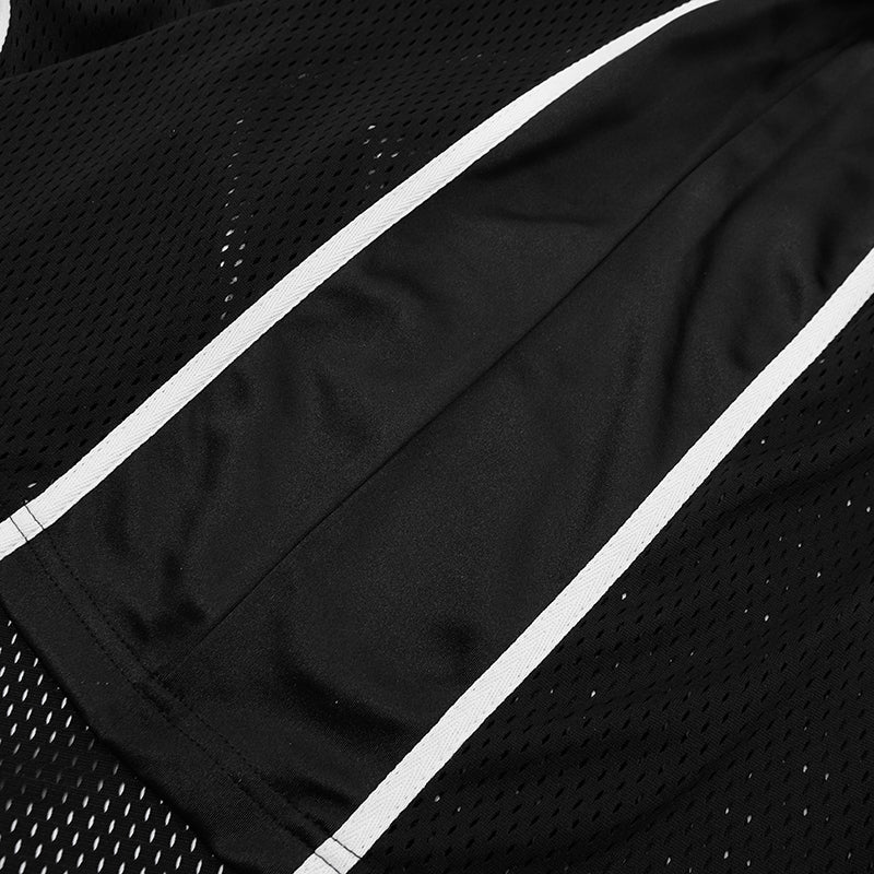 Black mesh oversized football jersey tee with white side stripes and a smooth center panel