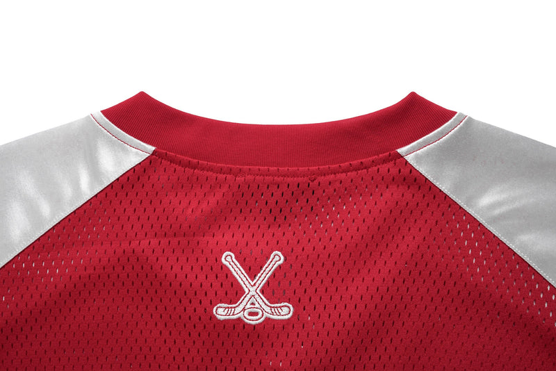 Red mesh hockey jersey T-shirt with silver shoulder panels and crossed sticks embroidery on chest