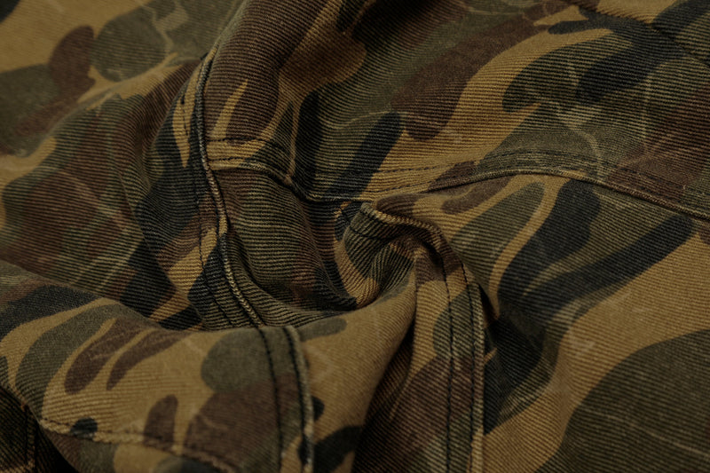 Close-up of camo shorts crotch seam and front panel stitching