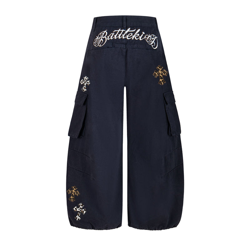 Black cargo pants back view with leopard cross embroidery and script waistband detail