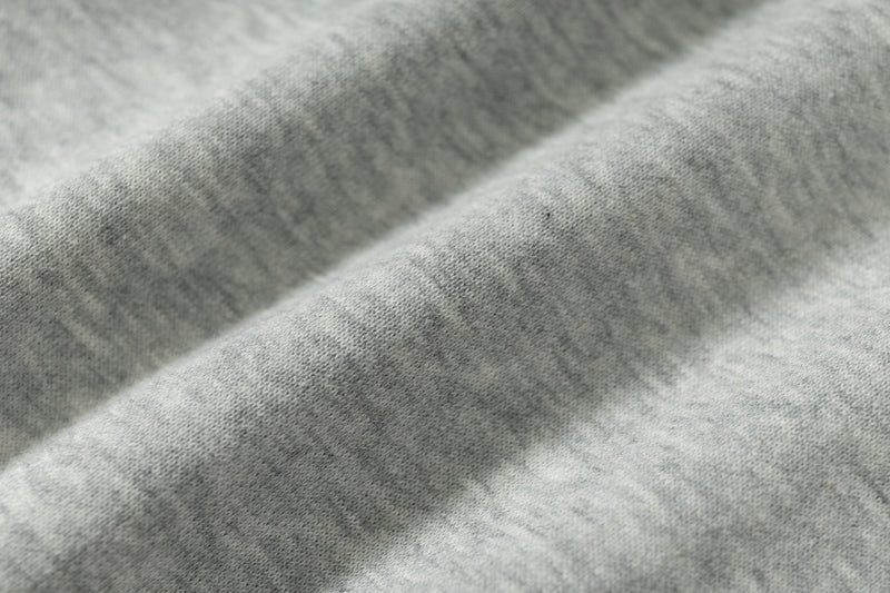 Close-up of soft grey sweatshirt fabric texture