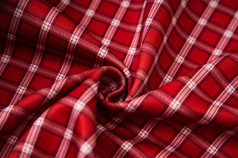 Close-up of red plaid lining with white checks inside the hoodie hood