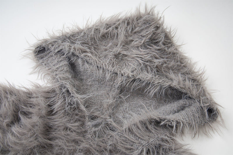Close-up of gray shaggy knit collar and shoulder texture
