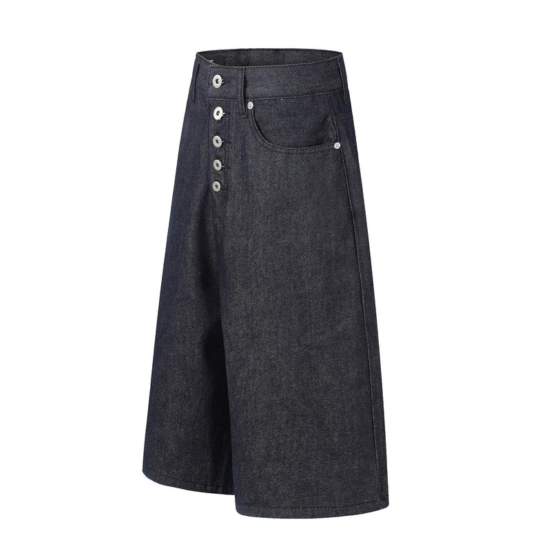 Angled front view of dark wash wide-leg denim jorts with button fly and front pocket