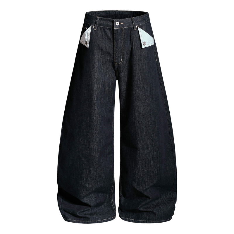 Front view of dark wash wide-leg denim pants with buckle detail and light contrast pocket flaps