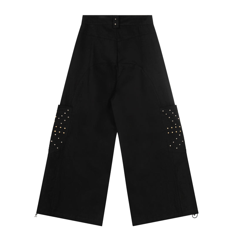 Back view of black wide-leg cargo pants with studded side pockets