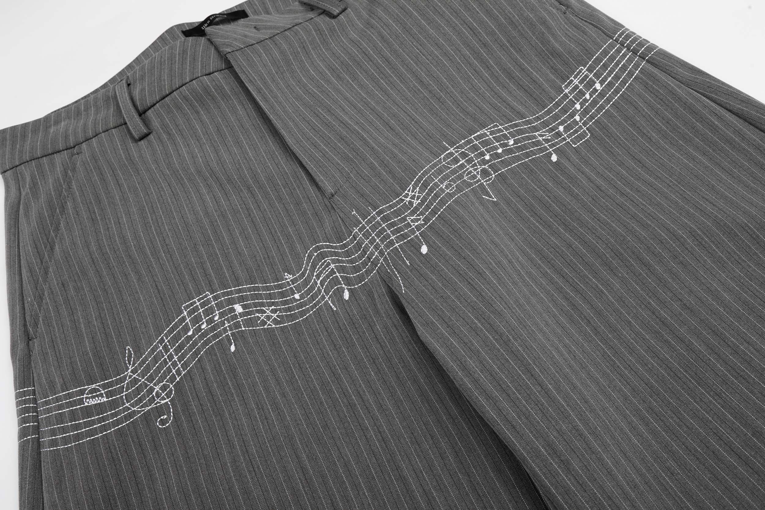 Pinstripe Wide-Leg Pants with Music Staff Graphic | Omirad