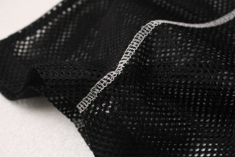 Black mesh jersey tee with visible white overlock stitching and textured athletic fabric close-up