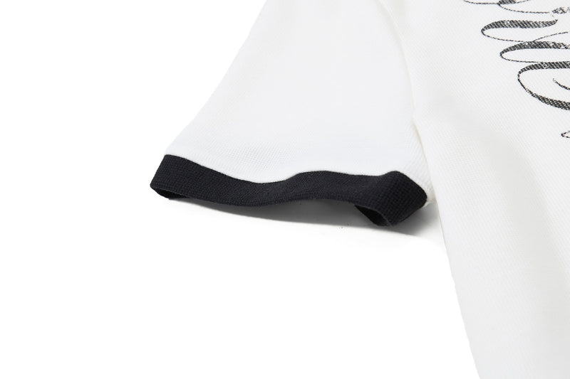 White gothic polo shirt with black contrast sleeve cuff and star skull graphic detail