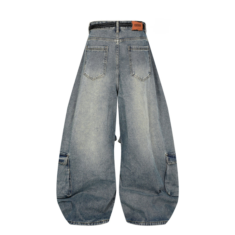 Back view of wide leg blue jeans with two back pockets and brown patch label