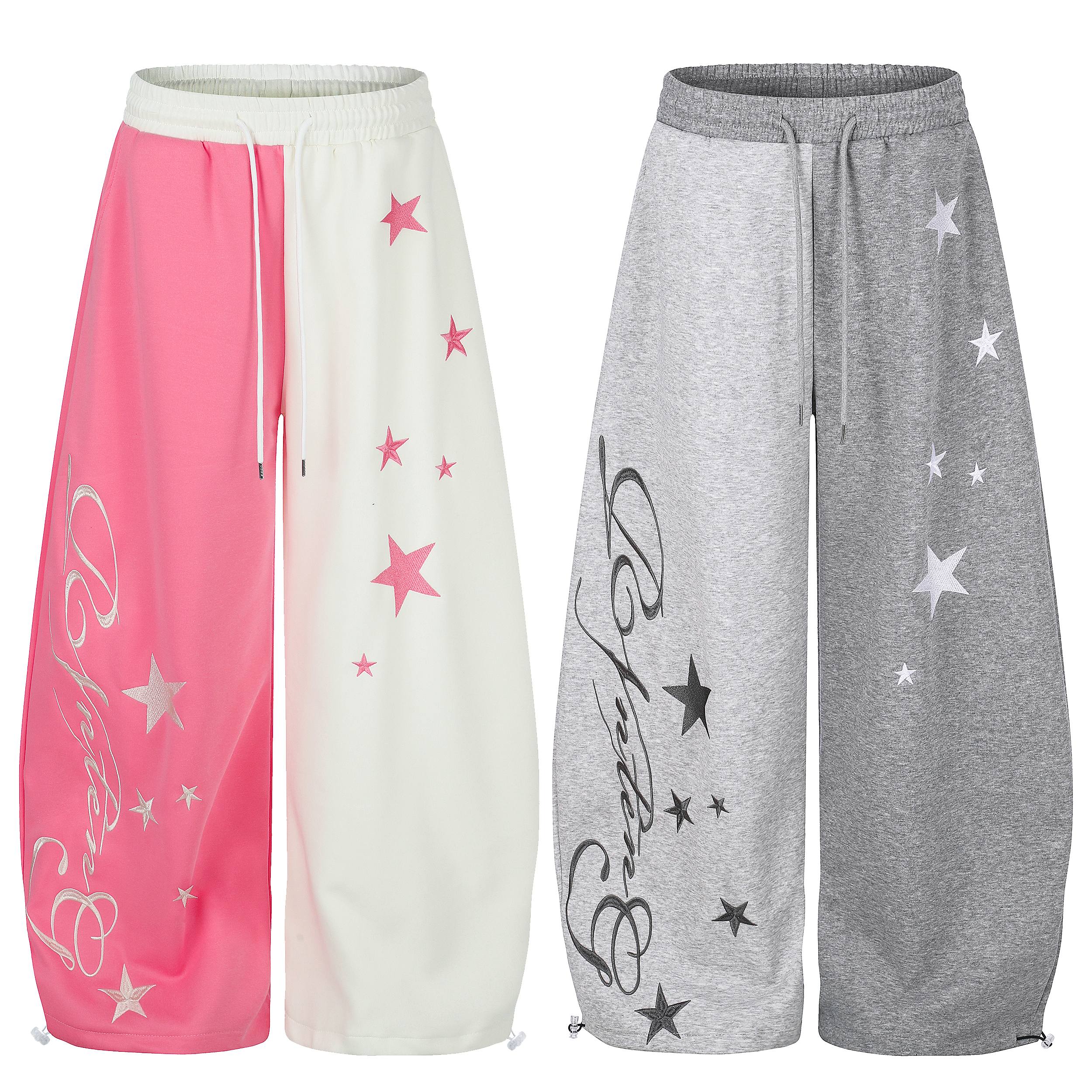 Omirad star gradient wide-leg sweatpants in pink and cream colorblock and grey, with star embroidery and cursive script print