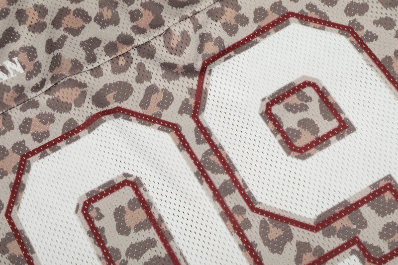 Leopard print mesh varsity jersey with red outlined number detail on white fabric