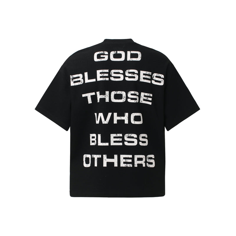 Black streetwear graphic tee with bold distressed back print reading God Blesses Those Who Bless Others