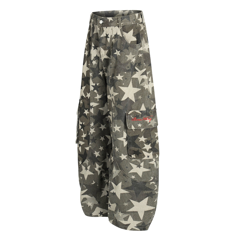 Angled front view of star camo cargo pants with large side pocket and red script detail