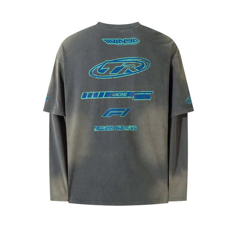 Gray layered tee back view with blue TR and McCann Brothers graphics