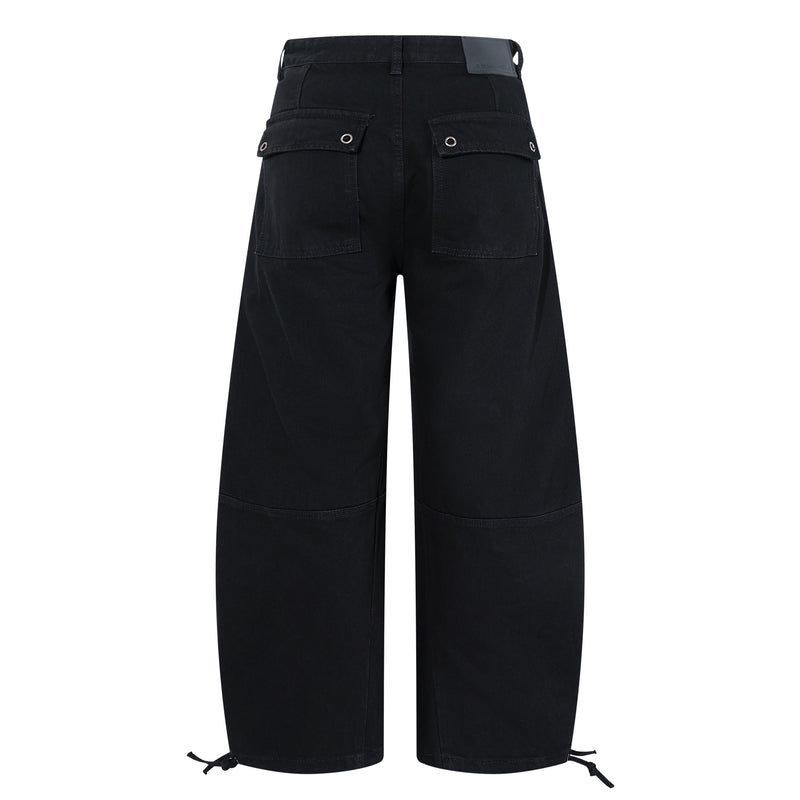 Black wide-leg denim pants back view with flap pockets and drawcord hems