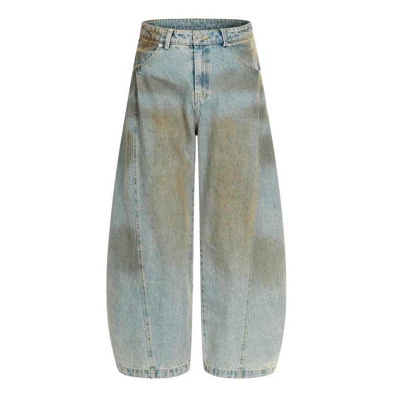 Washed barrel leg jeans in light blue denim, front view with wide legs and faded finish