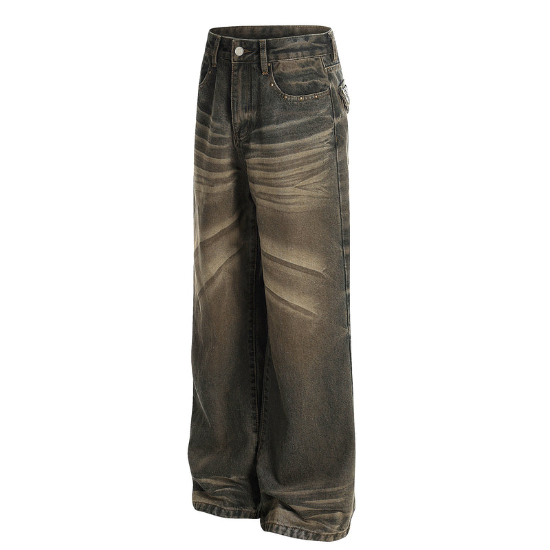 Angled front view of wide-leg jeans showing dark wash, whiskering, and straight leg fit