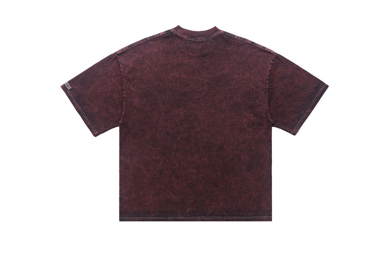 Vintage-wash burgundy graphic tee with a faded back, short sleeves, and crew neck displayed on a white background