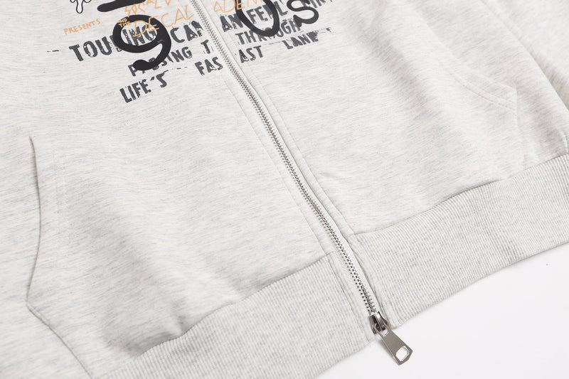 Close-up of light gray hoodie front zipper and graphic print