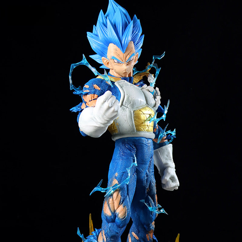 The Seakoff Vegeta Collectible Figure (55cm) captures the essence of Dragon Ball Z with its intense Super Saiyan energy and features three interchangeable heads: Super Saiyan, Super Saiyan Blue, and Normal forms. Clad in striking blue and gold, it embodies dynamic spirit against a dark backdrop.