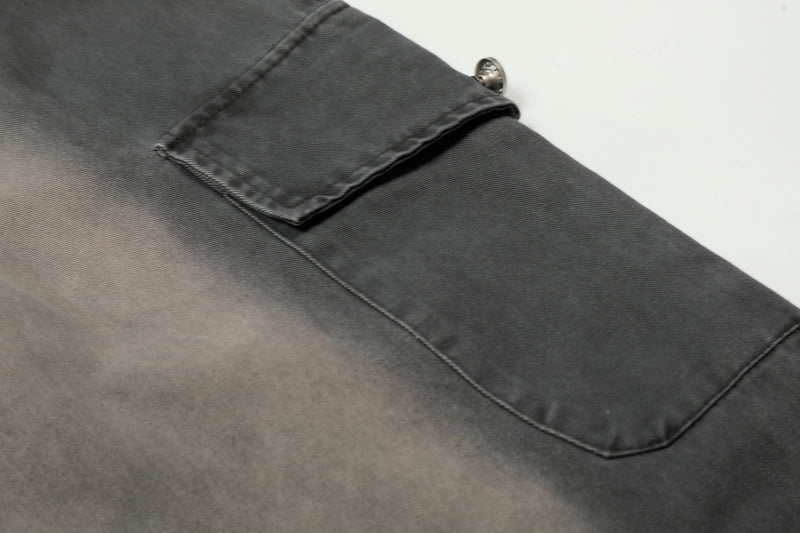 Close-up of side cargo pocket on charcoal washed wide-leg pants