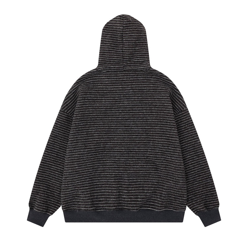 Back view of black striped knit hoodie with hood up and ribbed hem