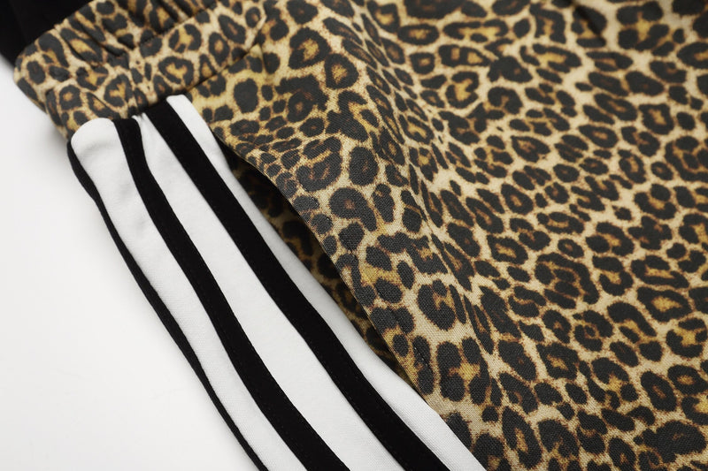 Close-up of leopard print side panel with white and black racing stripes