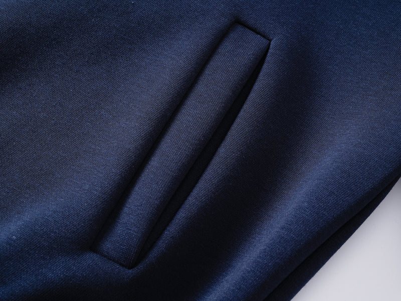 Close-up of navy hoodie front pocket opening