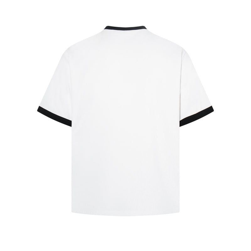 White graphic tee with black trim on collar and sleeves, shown from the back on a clean white background