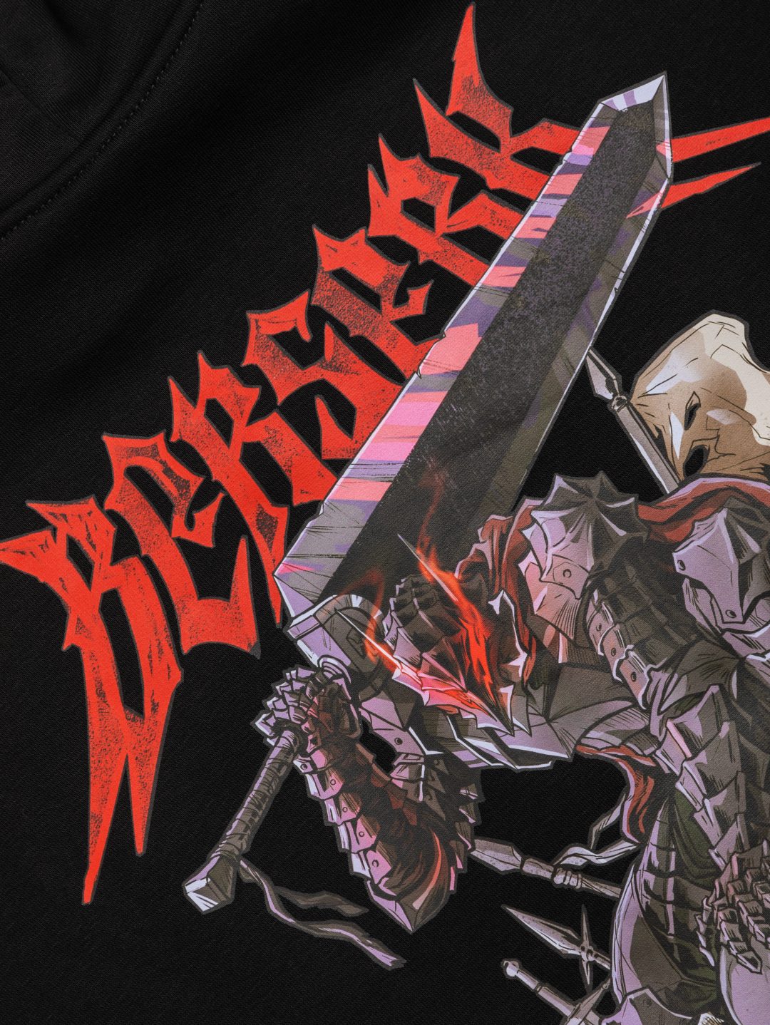 The Berserk Guts Anime Hoodie by Berserk features an illustration of an armored warrior with a large sword, echoing the Black Swordsman. A dynamic pose and detailed helmet stand out against a black background, topped with stylized red &quot;Berserk&quot; text.