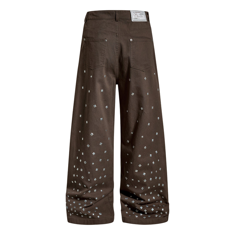 Brown wide-leg denim pants with back pockets and silver stud squares