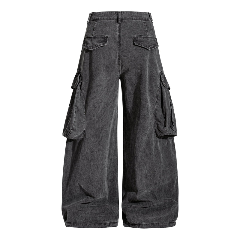 Back view of washed black wide-leg cargo pants with rear patch pockets
