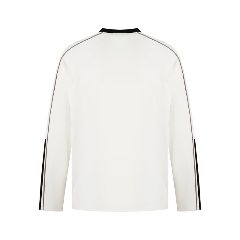 White long-sleeve raglan top with contrast piping, back view