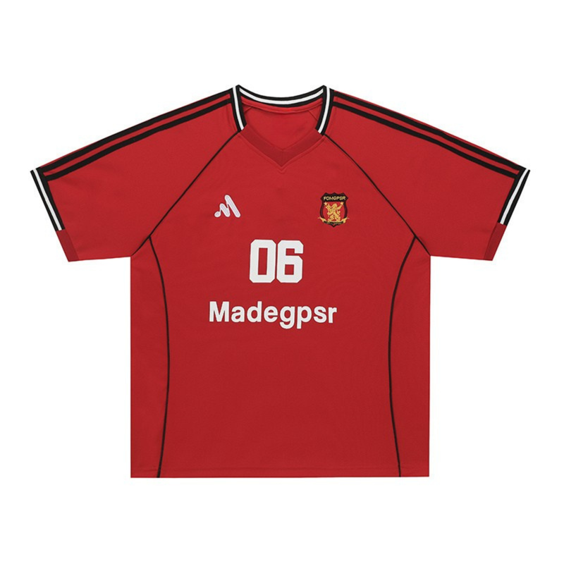 Red streetwear football jersey with black shoulder stripes, white number 06, and crest on the chest