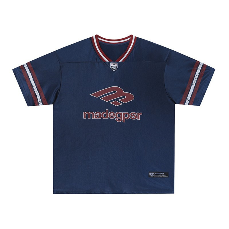 Navy athletic jersey tee with red-and-white striped V-neck and Madegpsr logo across the chest