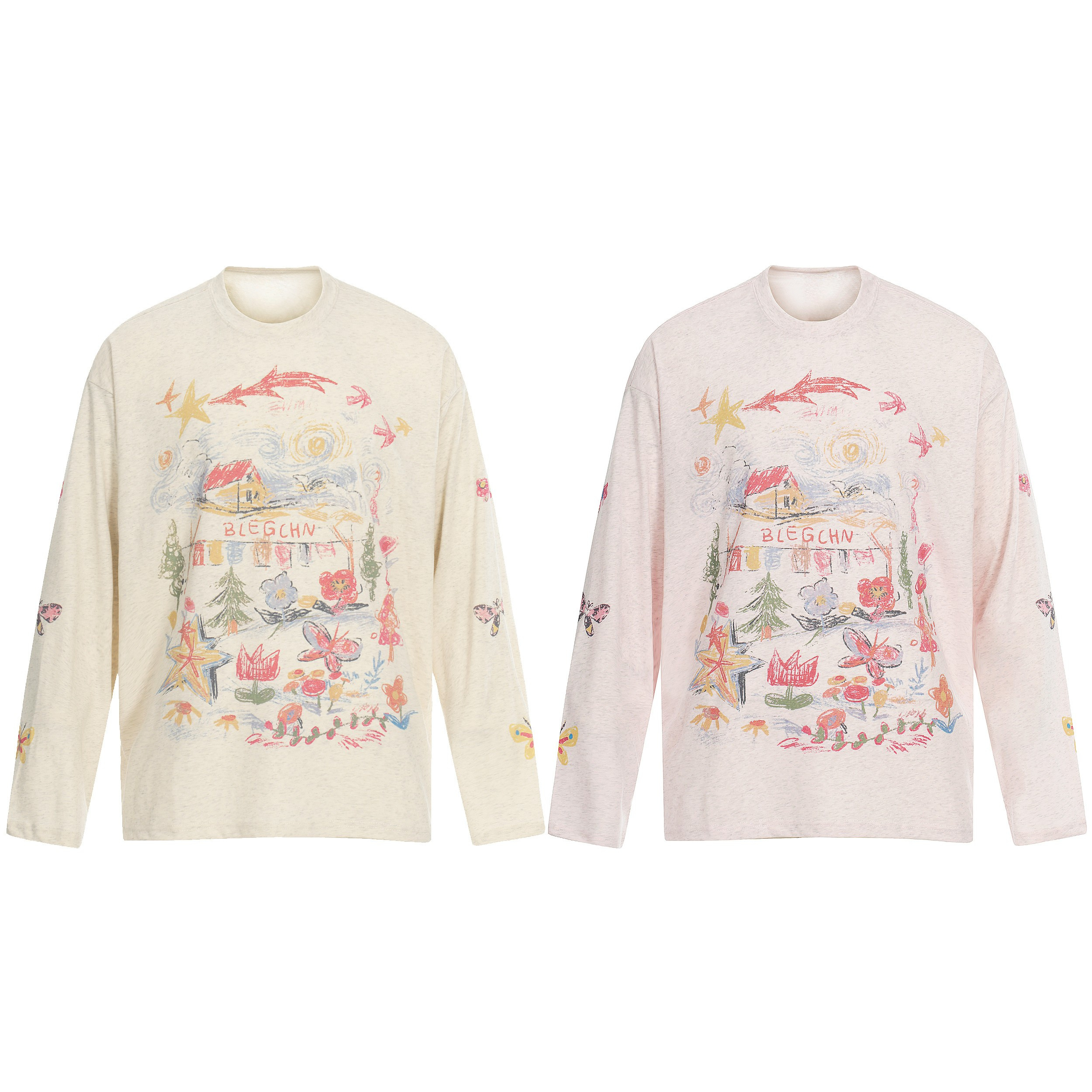 Cream long sleeve tee with hand-drawn crayon-style sketch graphic featuring a cottage, flowers, stars, and butterflies