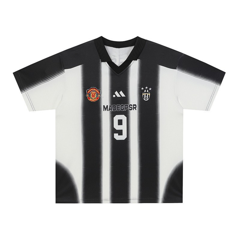 Black and white vertical stripe football jersey with number 9, club crests, and a V-neck collar