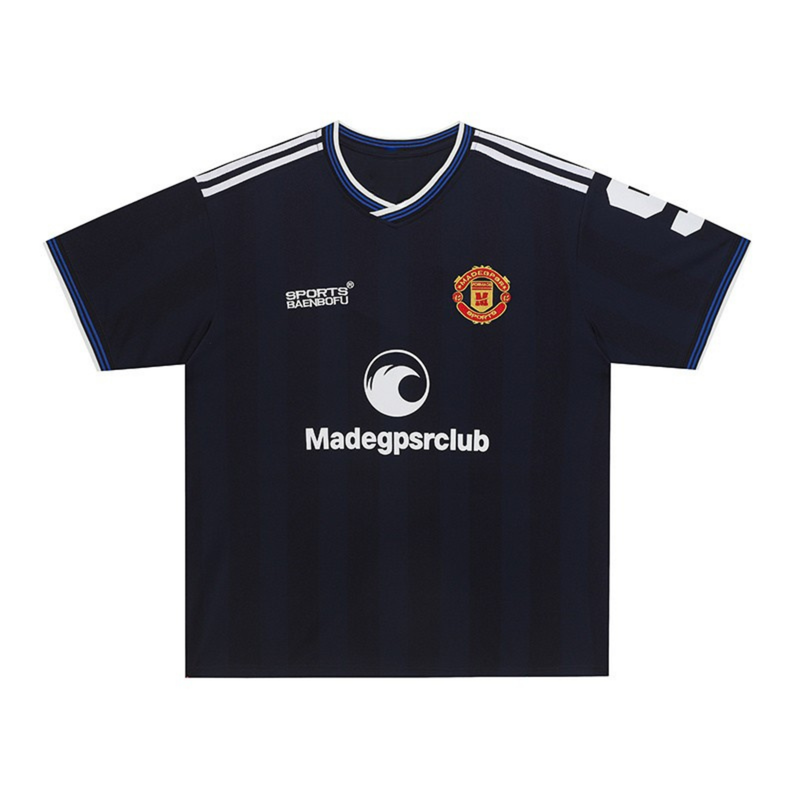 Black club logo soccer jersey with white and blue trim, short sleeves, and bold front sponsor graphics