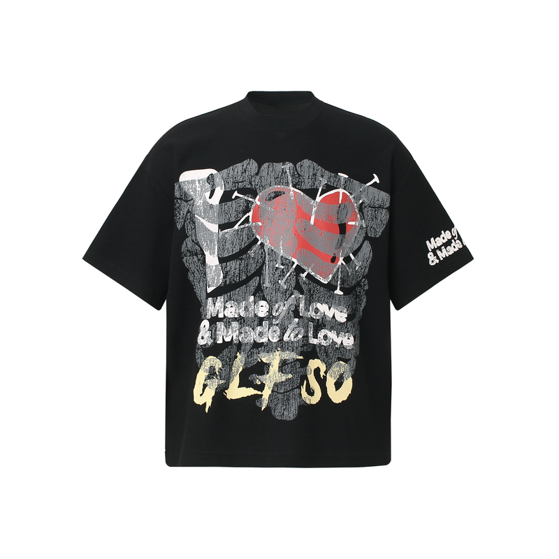 Black streetwear tee with a distressed heart graphic and Made of Love text in red, gray, and yellow print