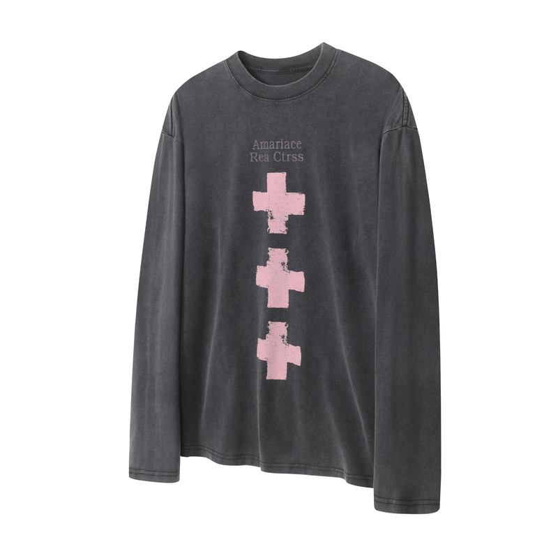 Black vintage wash long sleeve tee with pink cross graphics on the front