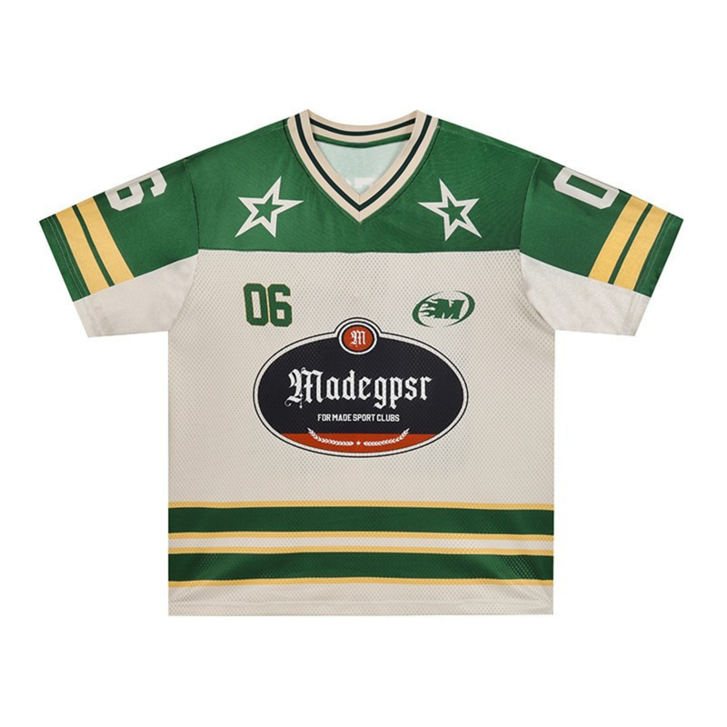 Green and white collegiate football jersey with number 06, star graphics, and striped sleeves in a streetwear style