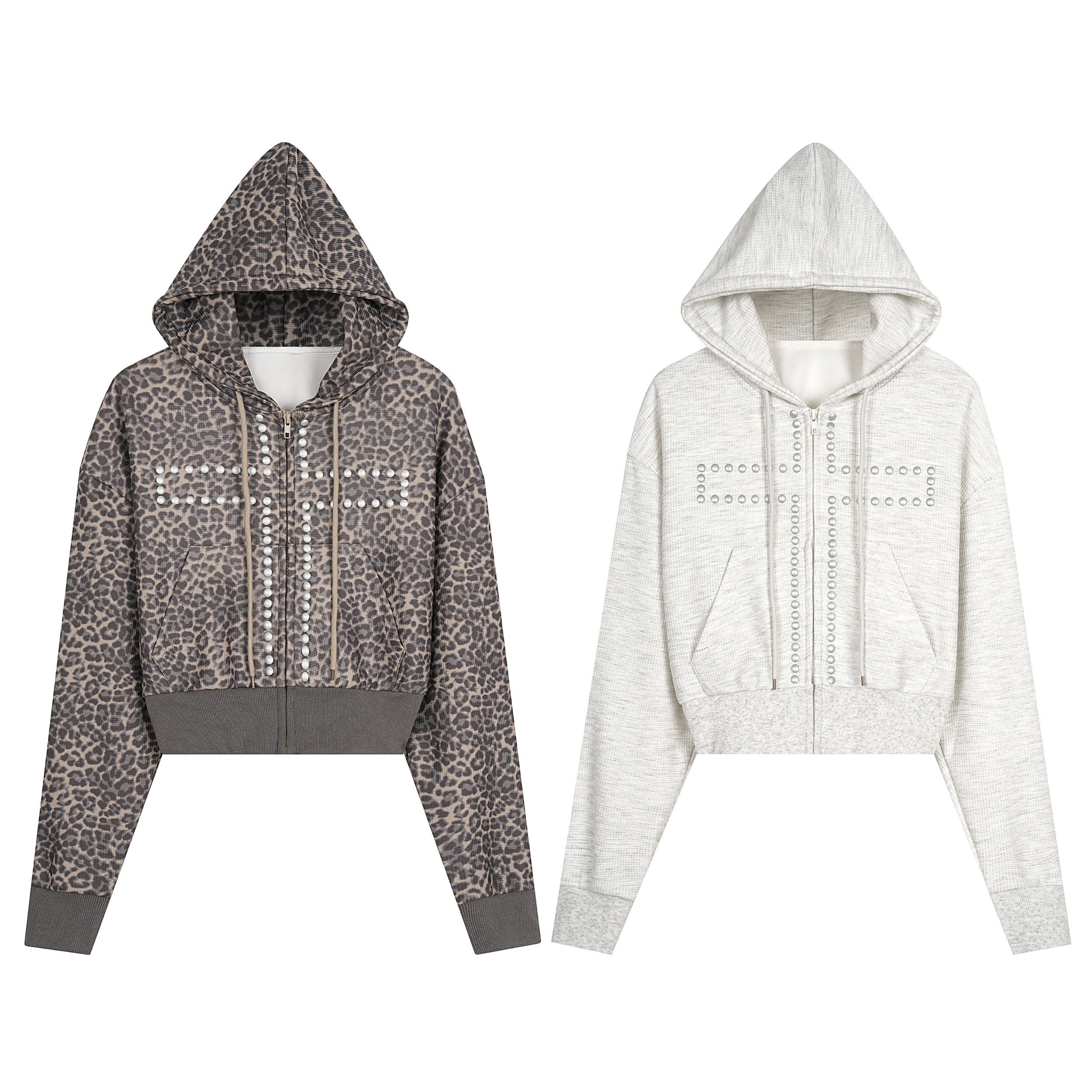 Leopard print cropped zip hoodie with silver studded cross embellishment and grey ribbed cuffs, laid flat on white background